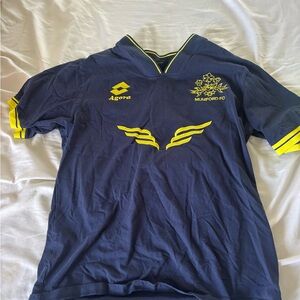 Agora Navy Blue Short Sleeve Soccer Jersey with Yellow Accents